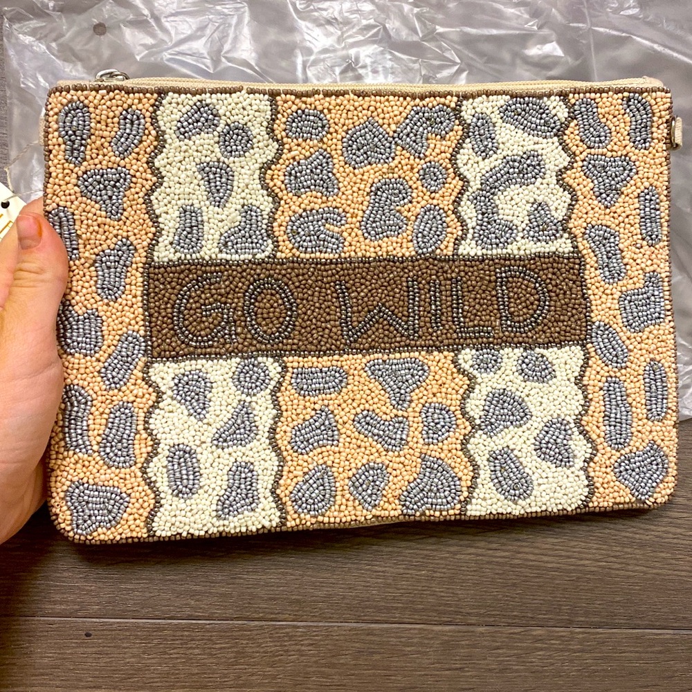 Brand new “go wild” beaded bag